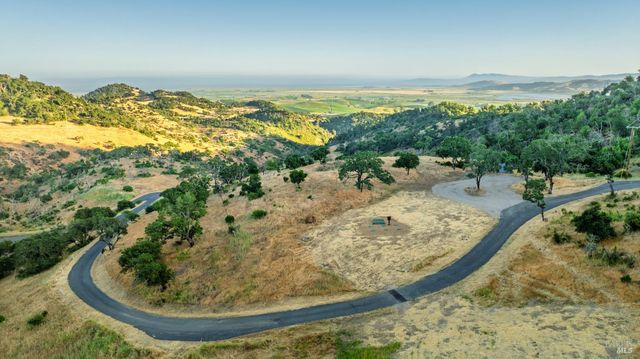 a view of a wooden floor with a view of lake