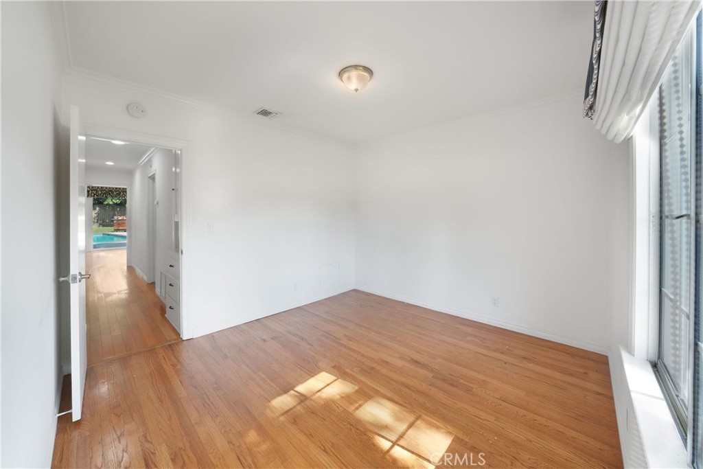 3837 Mountain View Avenue Pasadena, CA 91107 - Photo 20 of 41 a view of empty room with wooden floor