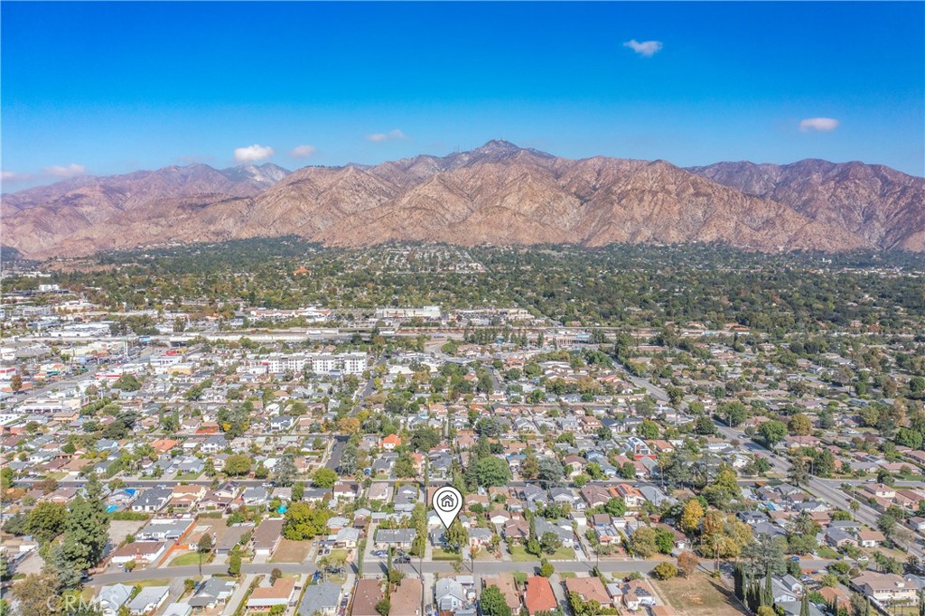 3837 Mountain View Avenue Pasadena, CA 91107 - Photo 32 of 41 a view of a field with mountains in the background