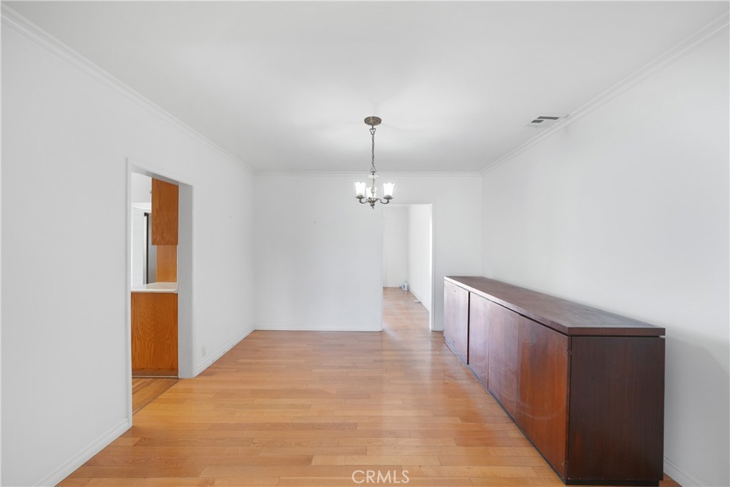 3837 Mountain View Avenue Pasadena, CA 91107 - Photo 8 of 41 a view of a hallway with wooden floor