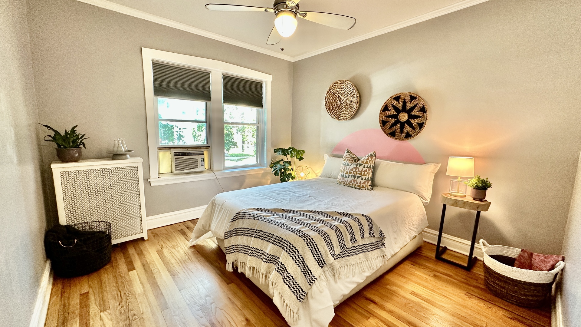1319 West Addison Street, Unit 1A Chicago, IL 60613 - Photo 7 of 20 a bedroom with a bed and a window
