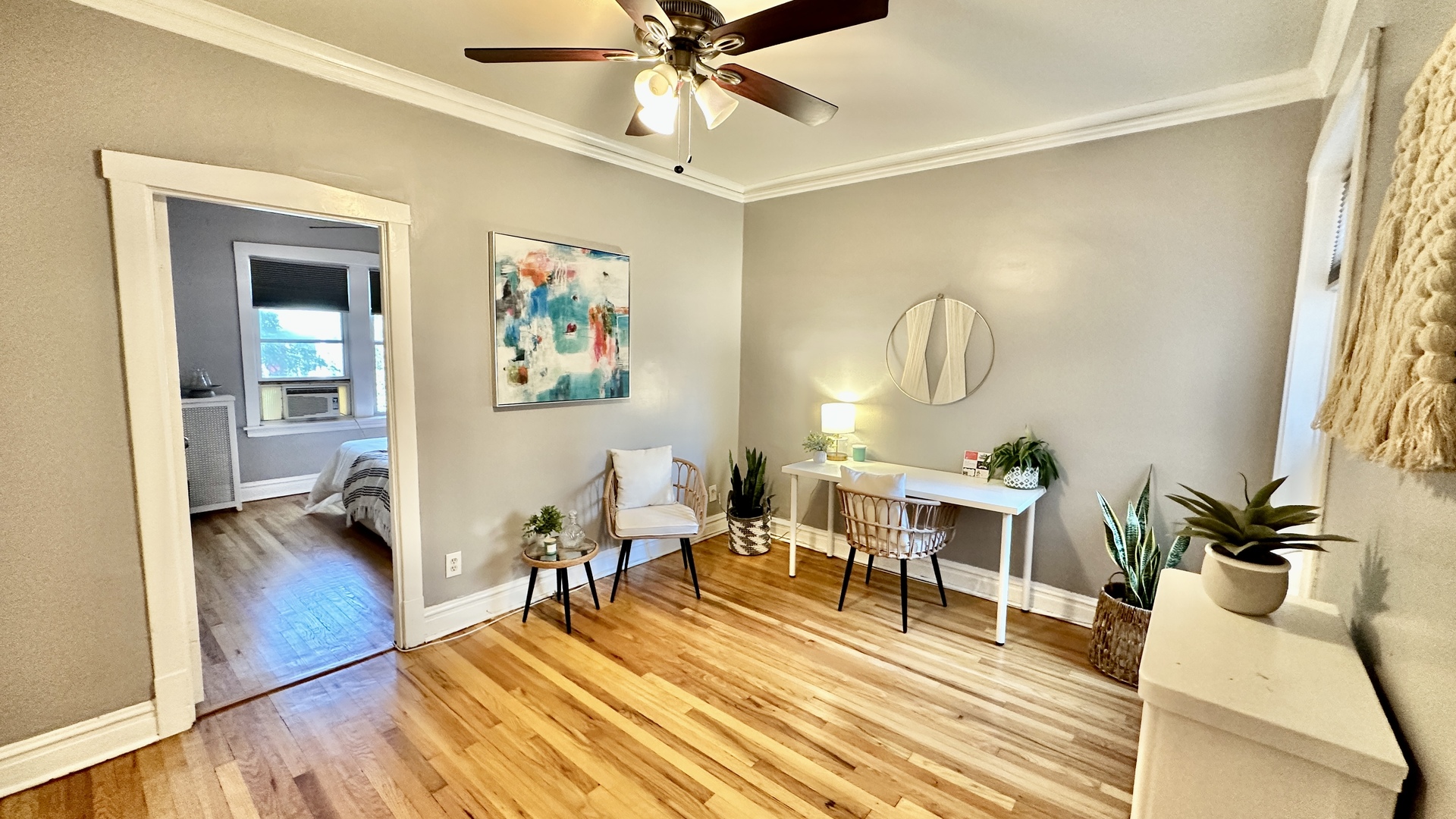 1319 West Addison Street, Unit 1A Chicago, IL 60613 - Photo 9 of 20 a living room with furniture and a wooden floor