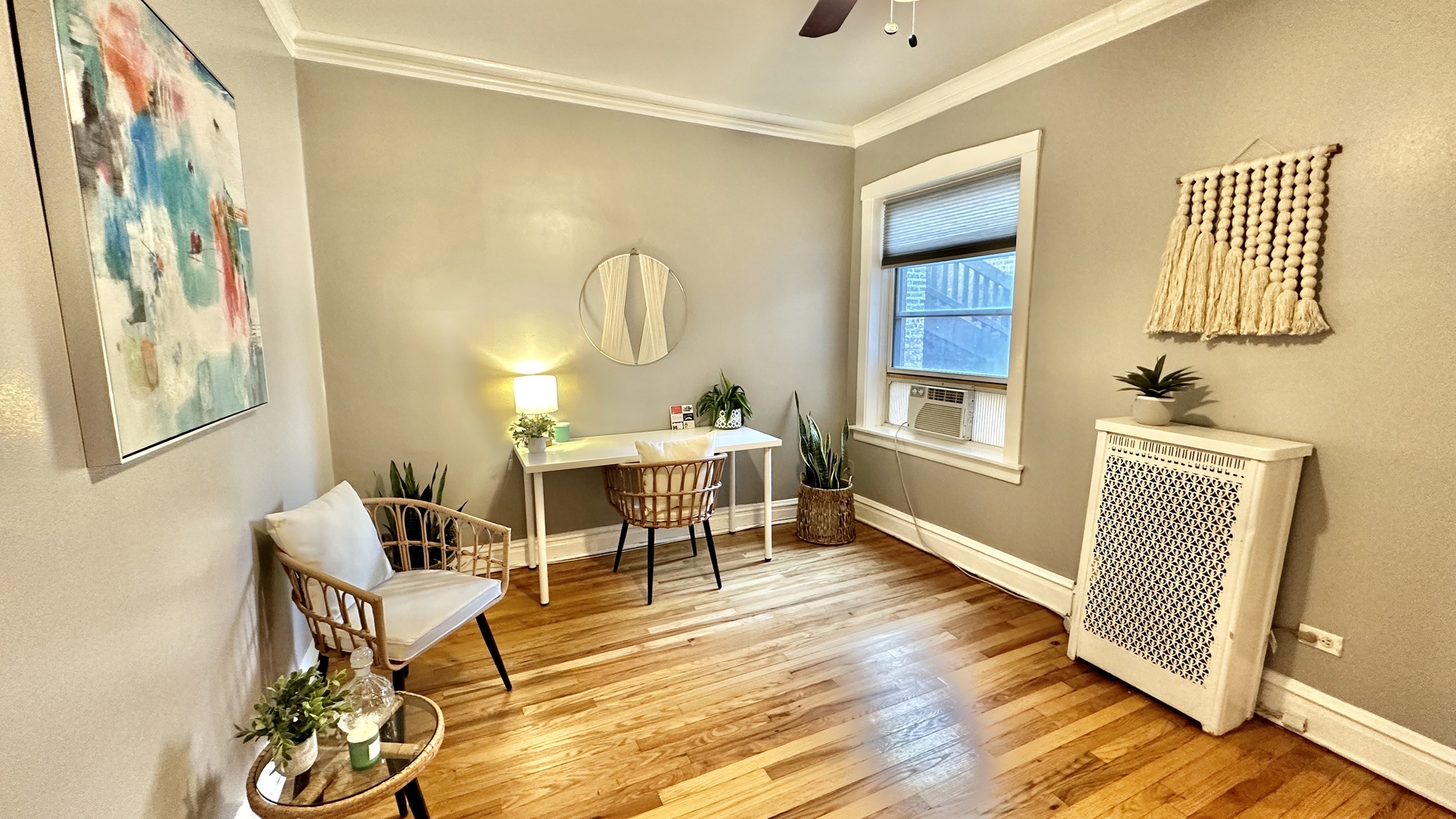 1319 West Addison Street, Unit 1A Chicago, IL 60613 - Photo 10 of 20 a living room with furniture and a window