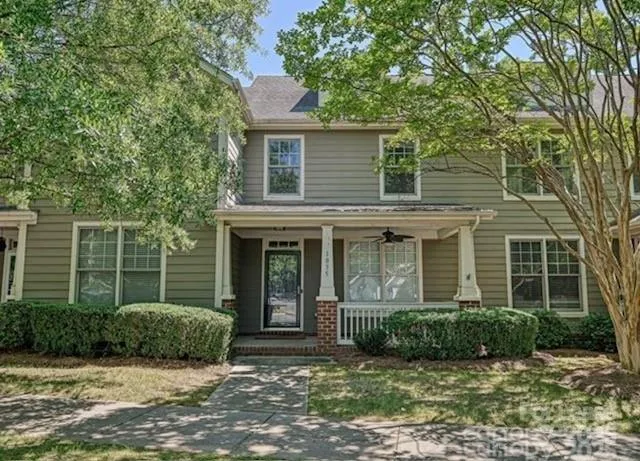 a view of a house with a garden