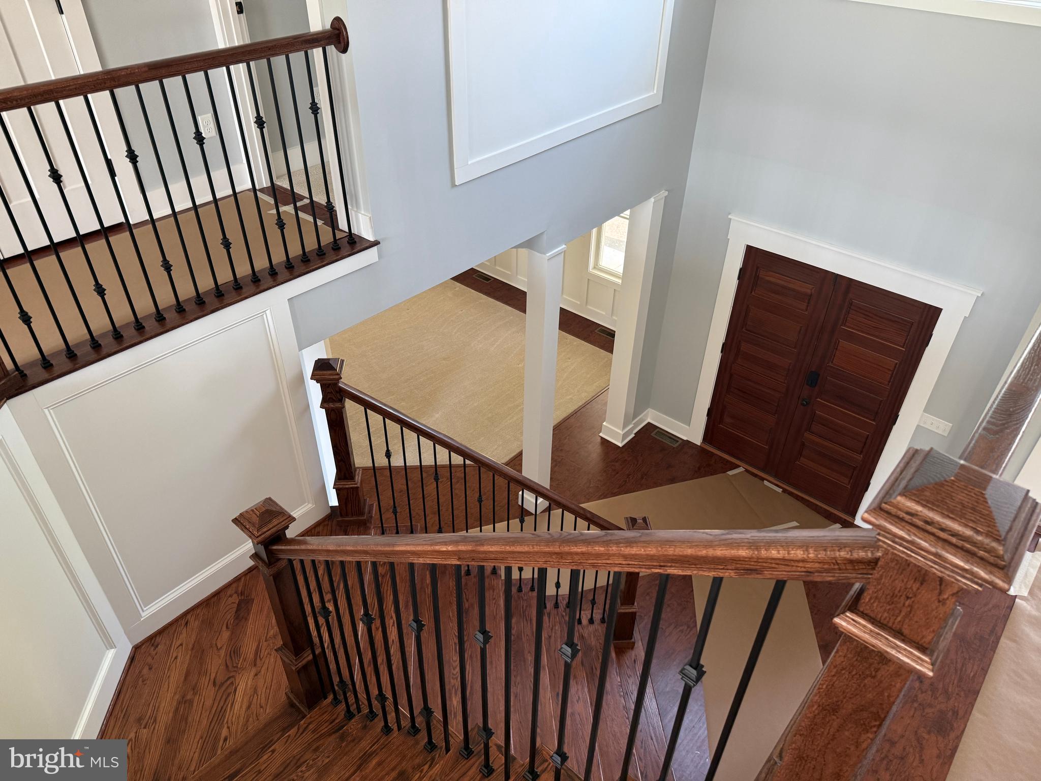 5482 Summit Bridge Road Townsend, DE 19734 - Photo 38 of 43 a view of staircase with wooden floor and white walls