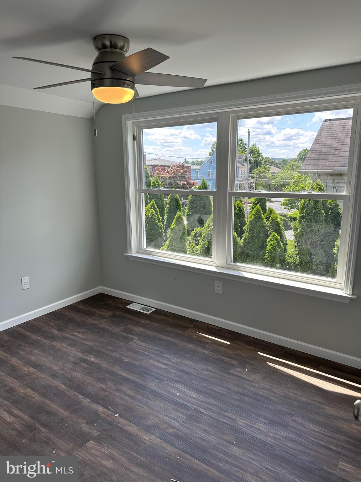 2102 Reading Avenue West Lawn, PA 19609 - Photo 14 of 17 a view of an empty room with a window and wooden floor