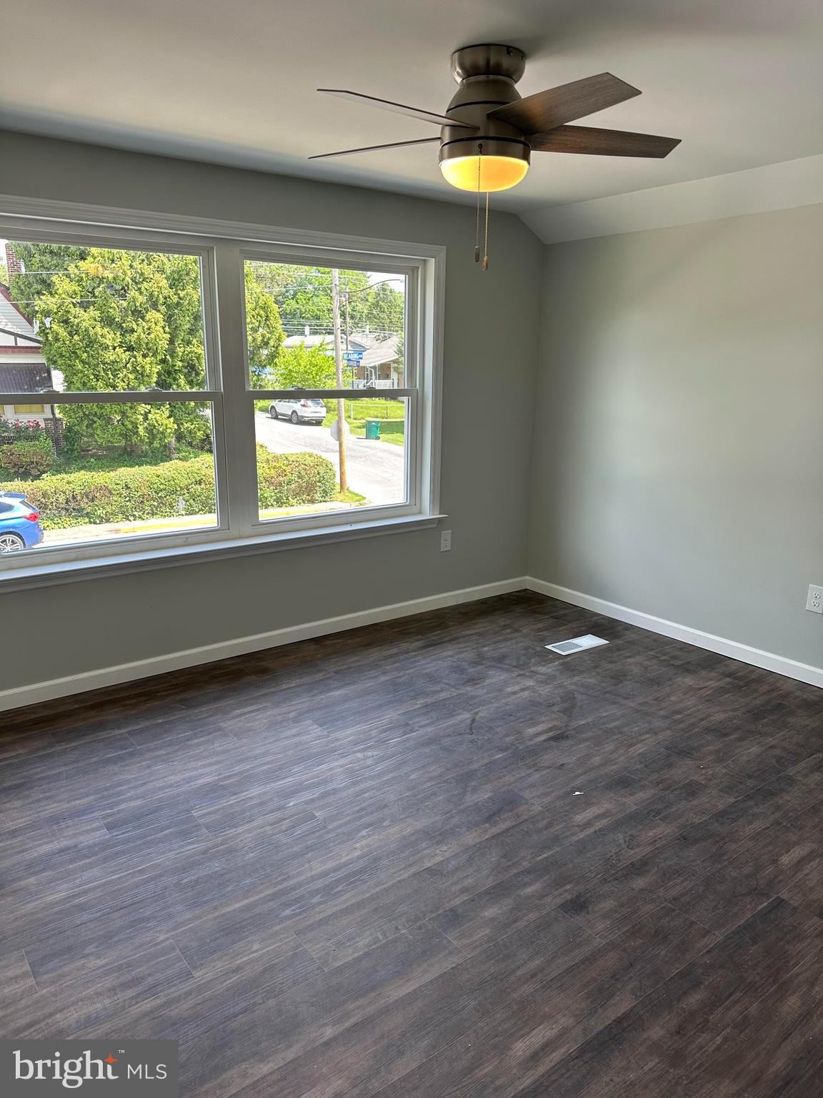 2102 Reading Avenue West Lawn, PA 19609 - Photo 7 of 17 an empty room with wooden floor and windows