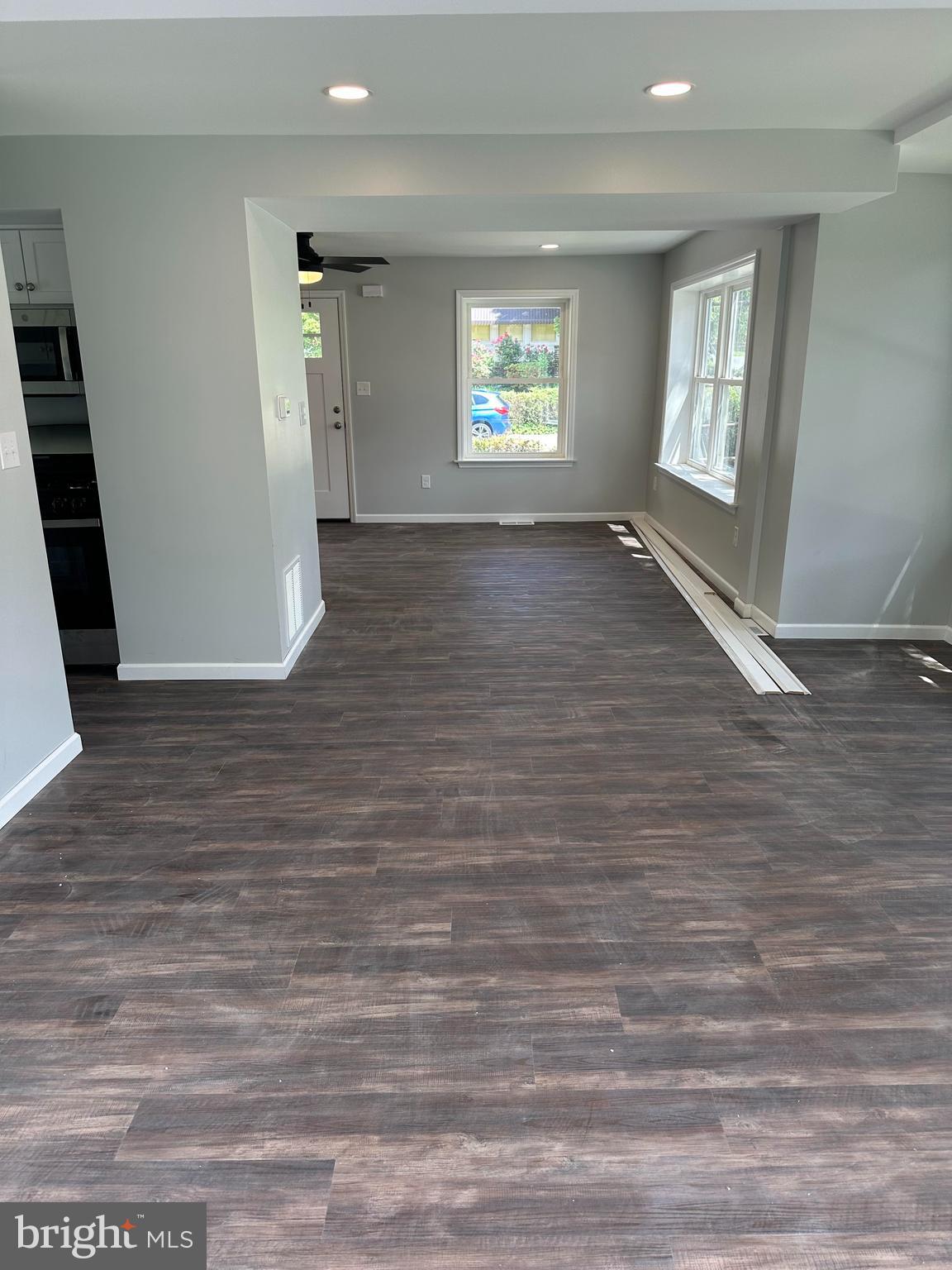 2102 Reading Avenue West Lawn, PA 19609 - Photo 8 of 17 an empty room with wooden floor and windows