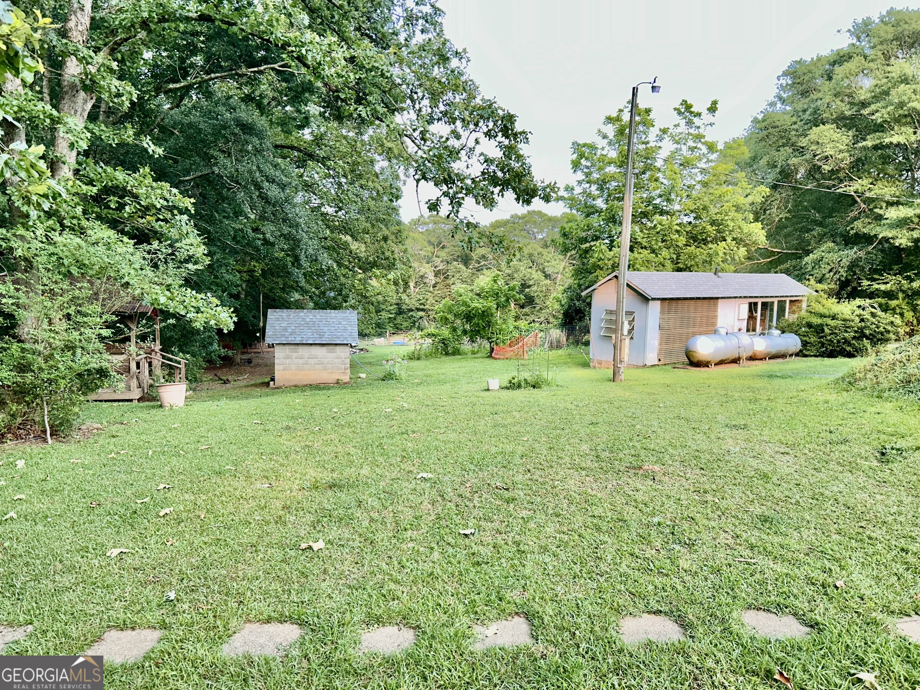 3272 Horace Road Bowman, GA 30624 - Photo 13 of 40 a house view with a garden space