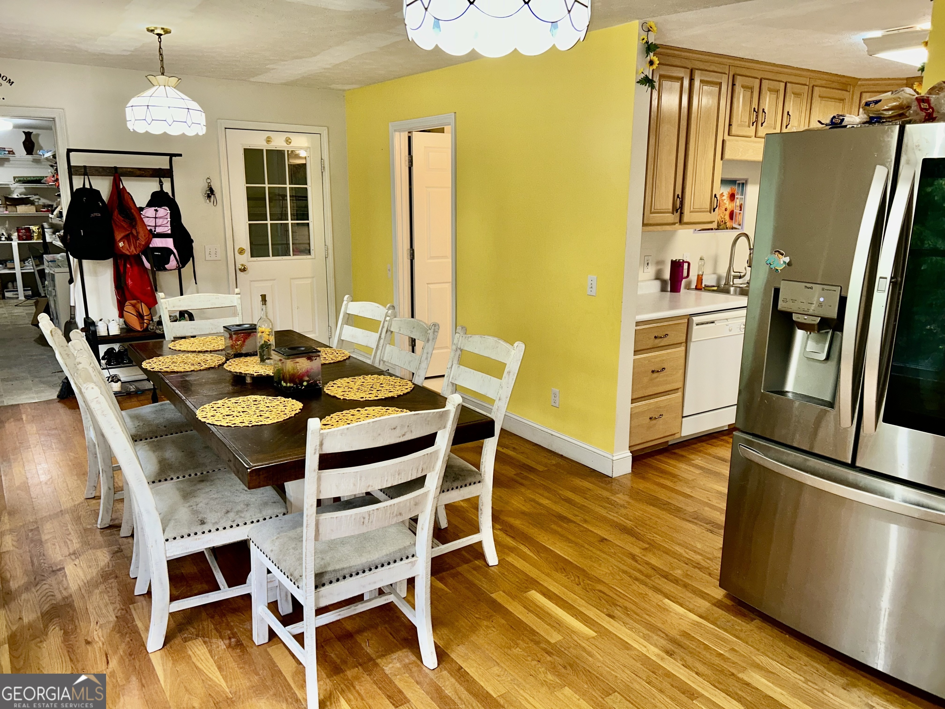 3272 Horace Road Bowman, GA 30624 - Photo 19 of 40 a view of a dining room with furniture window and wooden floor