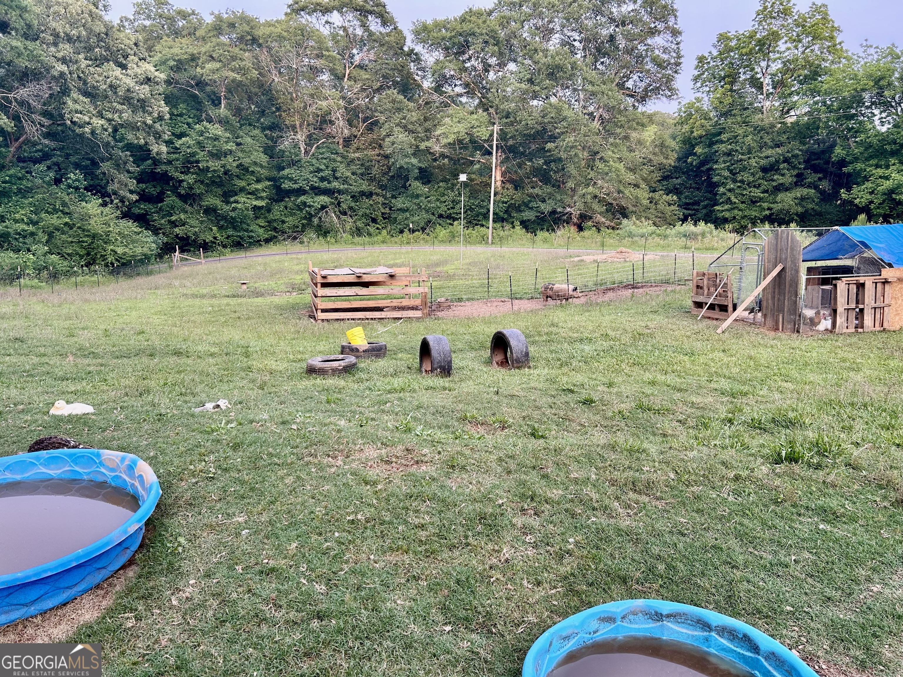 3272 Horace Road Bowman, GA 30624 - Photo 40 of 40 a view of a backyard with lawn chairs