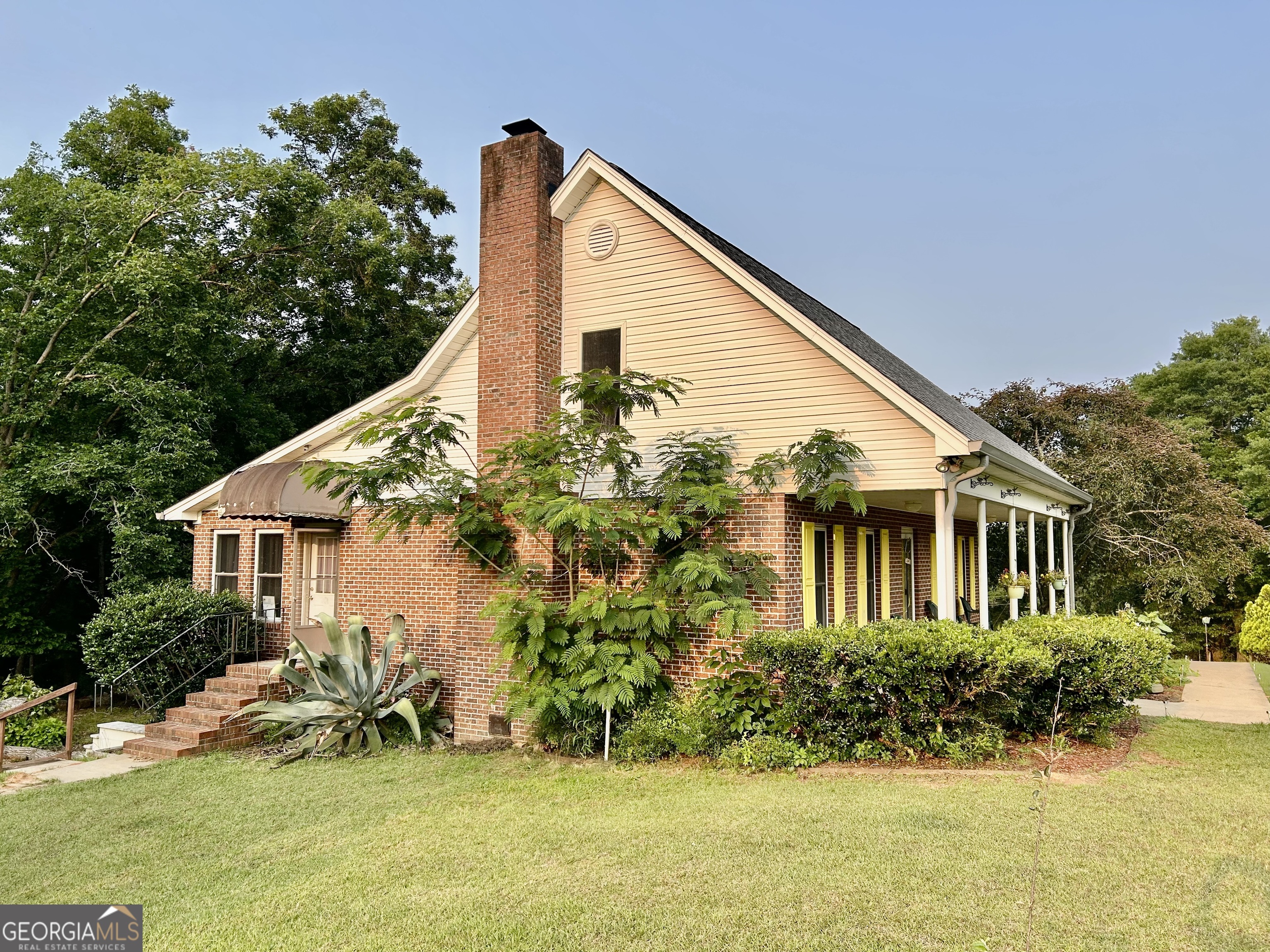 3272 Horace Road Bowman, GA 30624 - Photo 6 of 40 a view of a house with backyard and sitting area