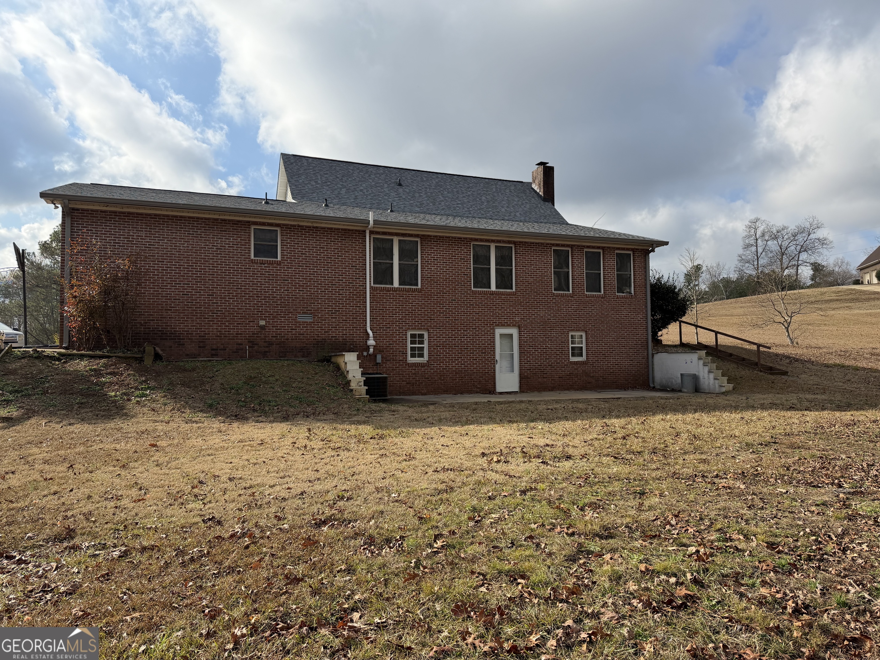 3272 Horace Road Bowman, GA 30624 - Photo 9 of 40 a front view of a house with a yard