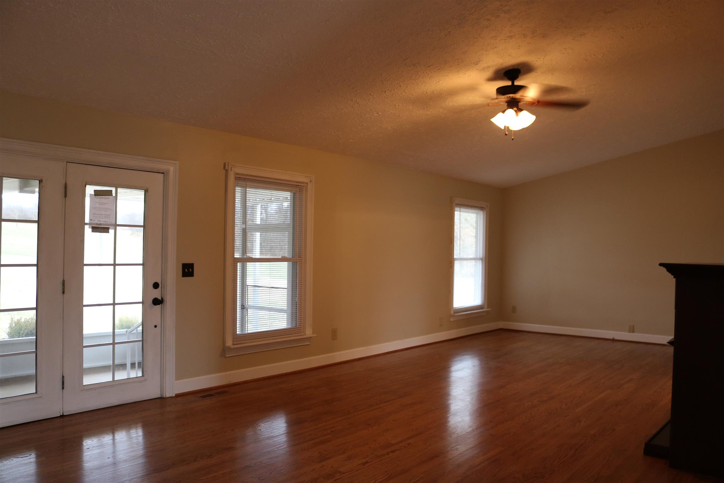 3963 Calista Road Cross Plains, TN 37049 - Photo 2 of 27 Gorgeous original hardwoods are in excellent shape and this living room gets awesome natural light making for a great space to hang out with family.