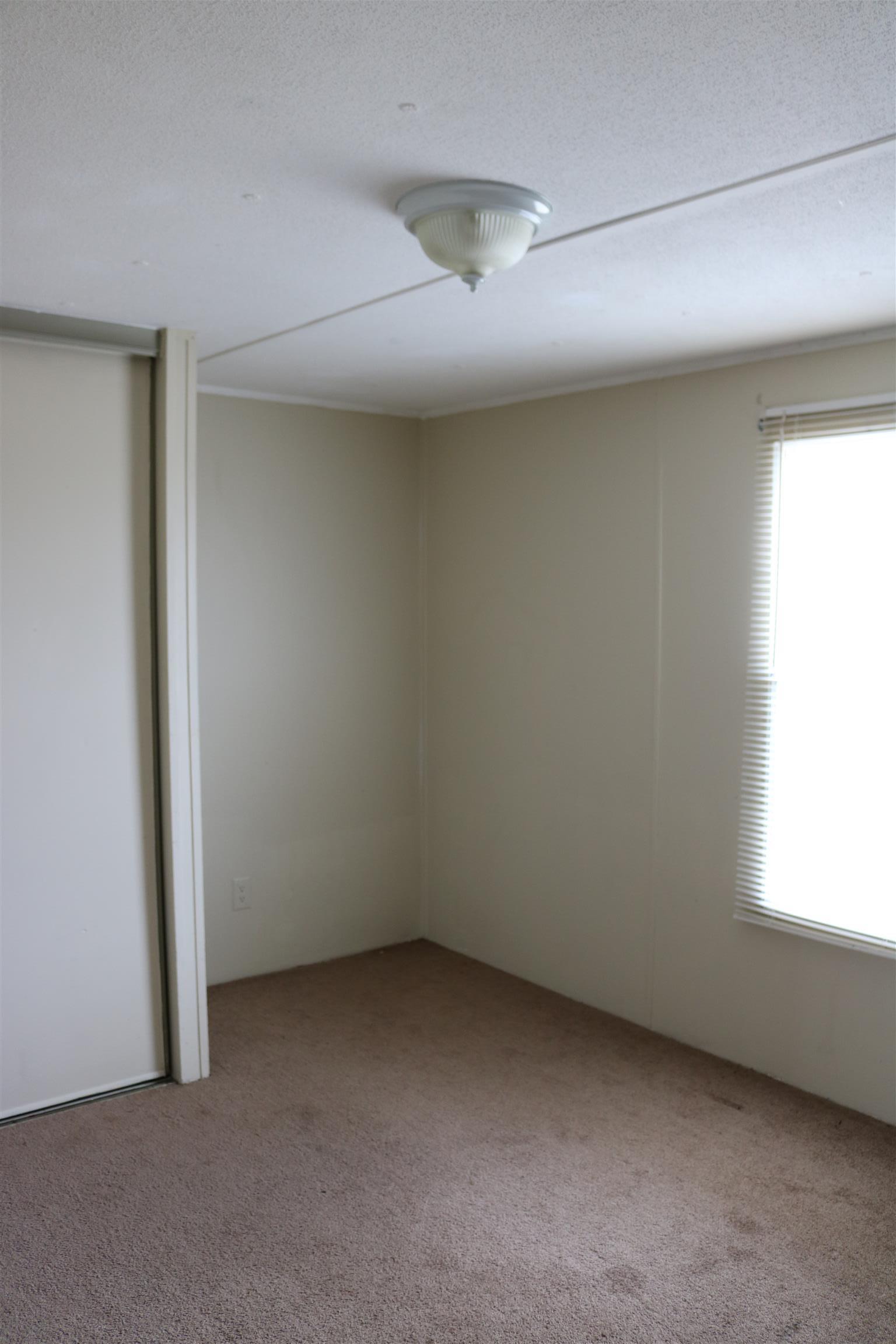 3963 Calista Road Cross Plains, TN 37049 - Photo 24 of 27 First bedroom inside the trailer has decent space and a good natural lighting.