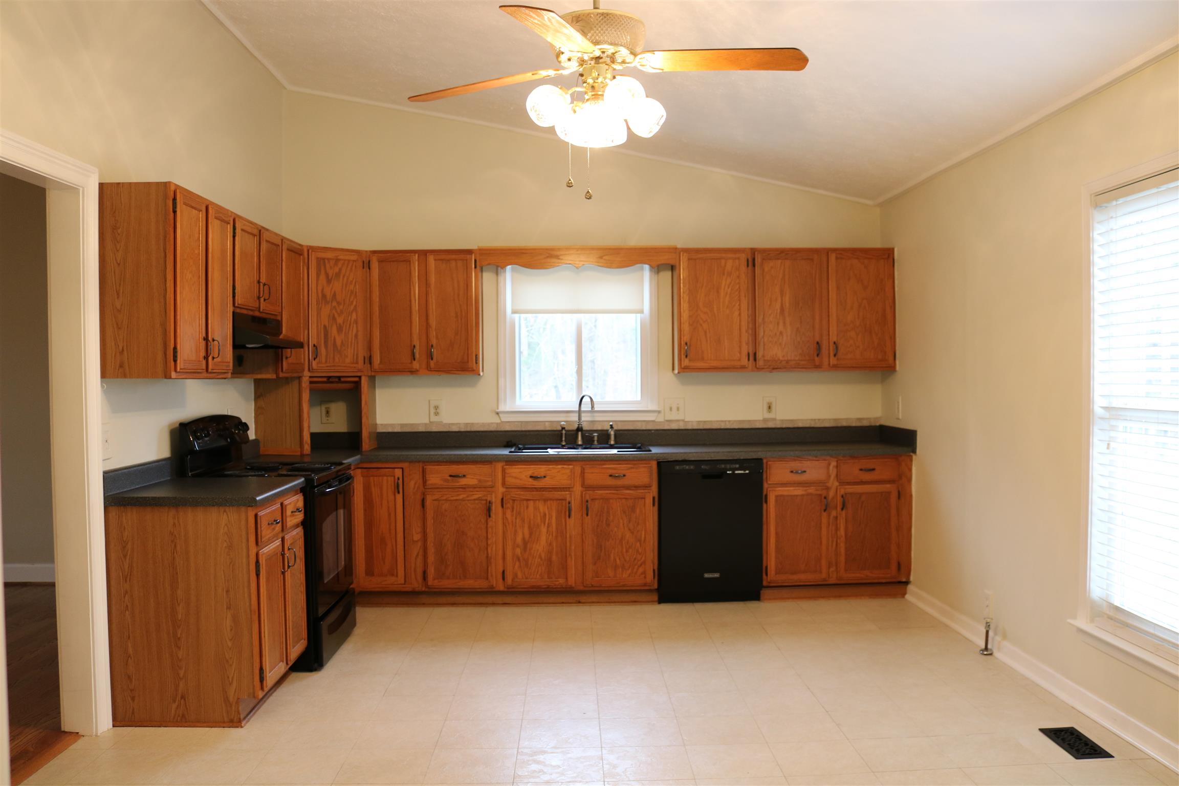 3963 Calista Road Cross Plains, TN 37049 - Photo 4 of 27 Kitchen is very spacious with tons of cabinetry and lots of counter space.