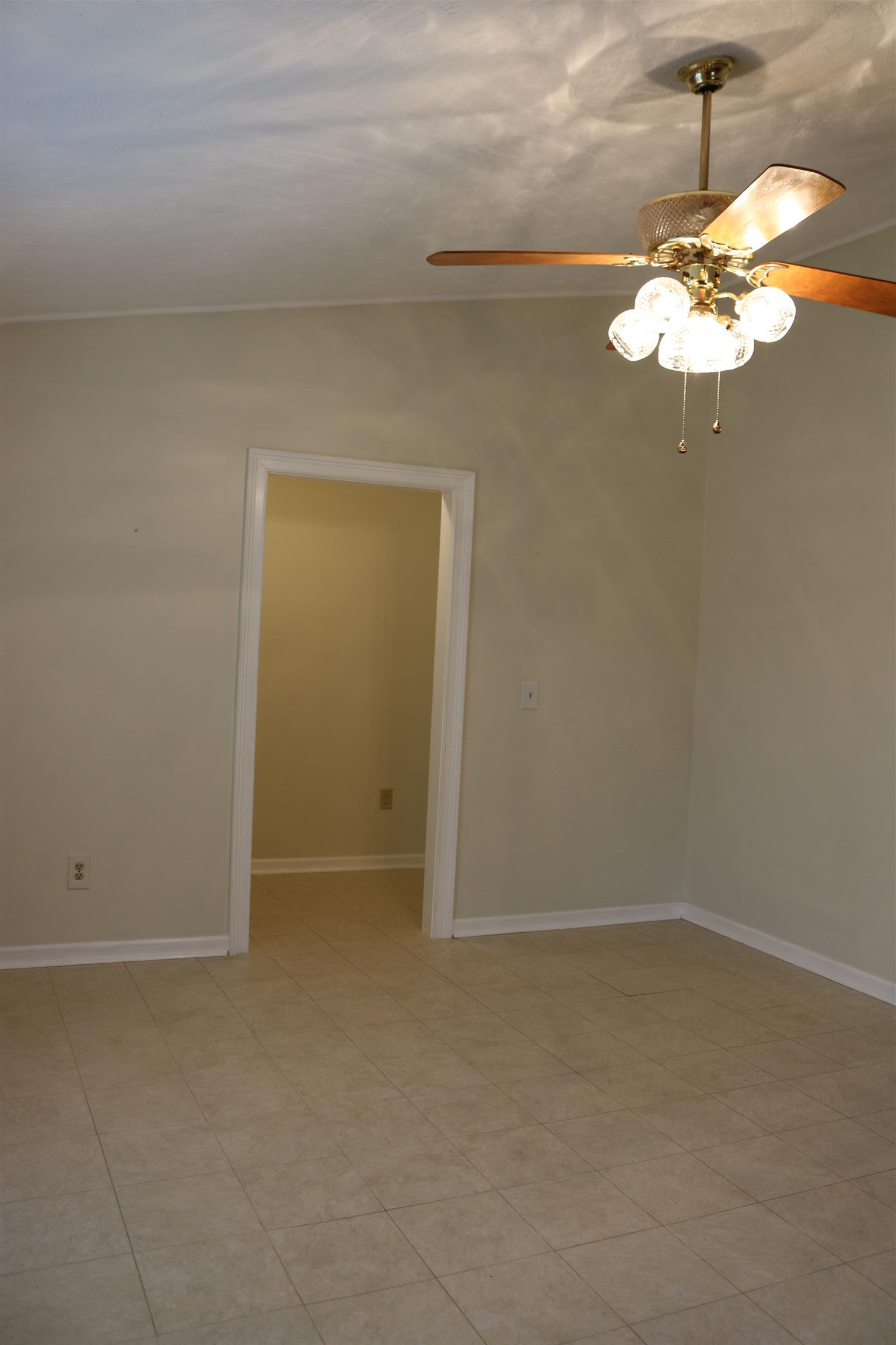 3963 Calista Road Cross Plains, TN 37049 - Photo 5 of 27 The view of the other side of the kitchen showing how large the space is. You can fit a regular size dining room table in here.