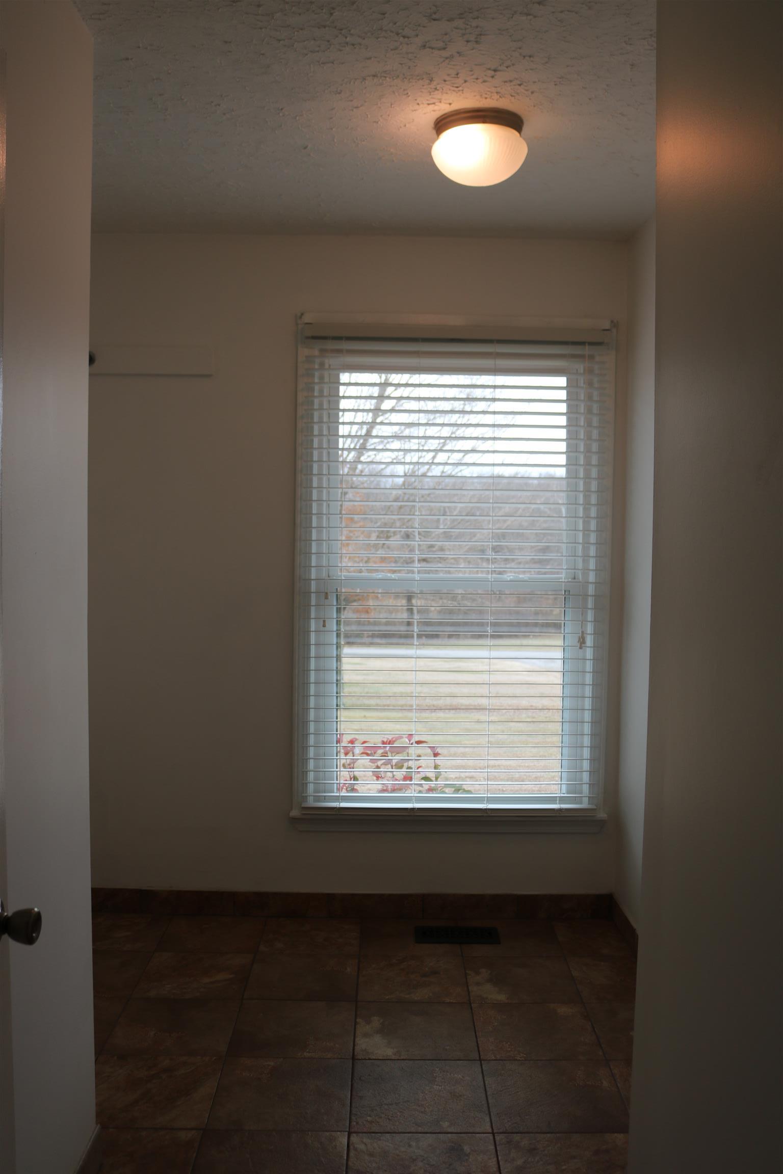 3963 Calista Road Cross Plains, TN 37049 - Photo 10 of 27 This home has an extra large fully tiled laundry room!
