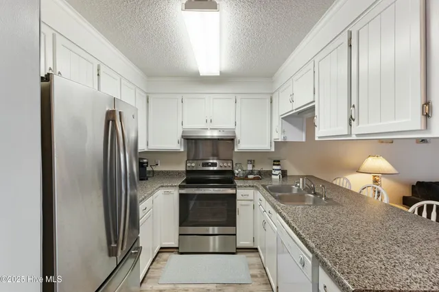 $429,000 | 505 Carolina Beach Avenue North, Unit 1F, Carolina Beach, NC 28428