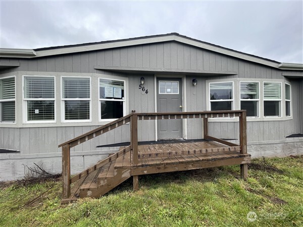 564 West Avery Road Winlock, WA 98596 - Photo 2 of 24 a front view of a house with a yard