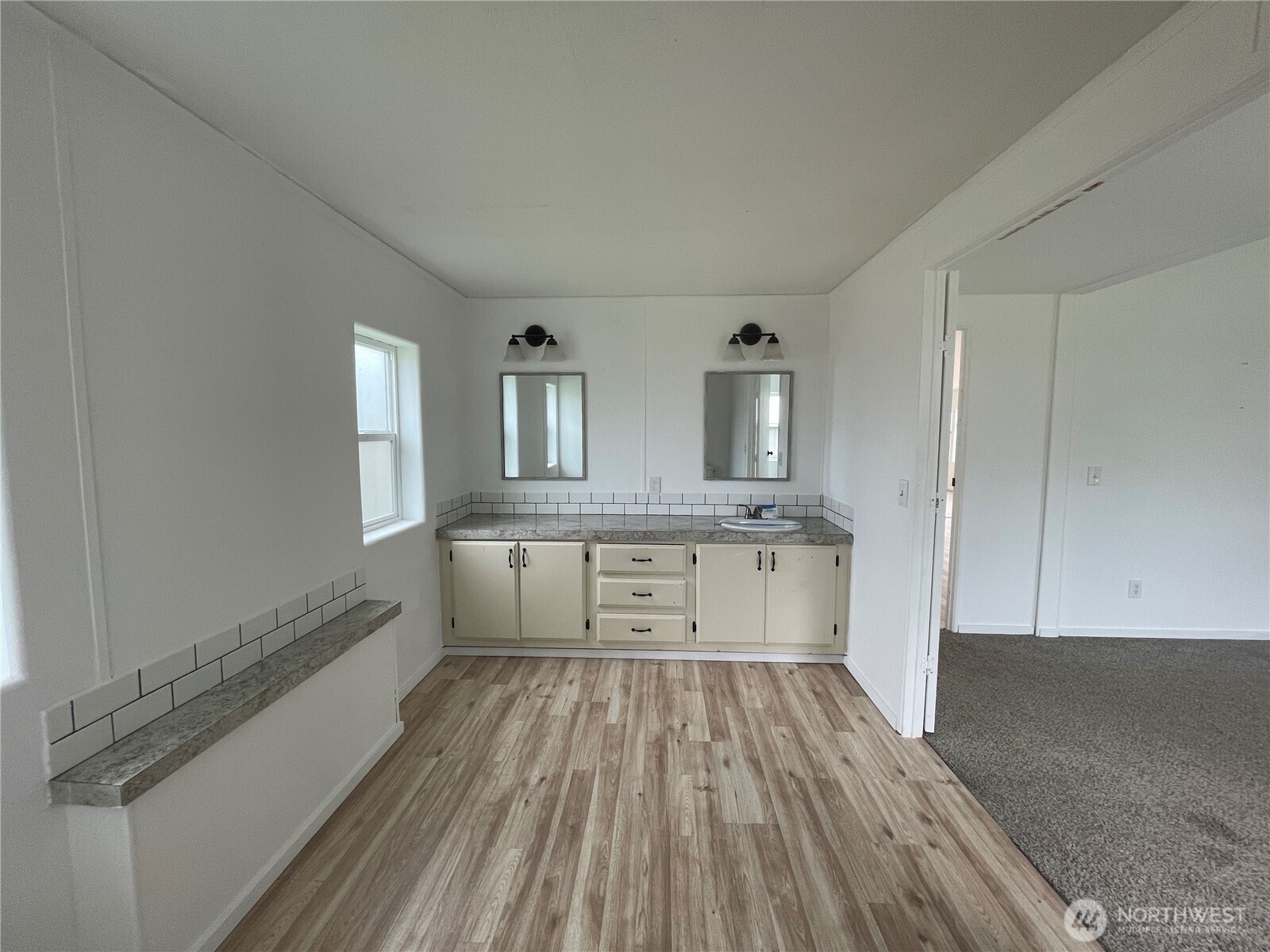 564 West Avery Road Winlock, WA 98596 - Photo 22 of 24 a view of a bathroom with sink and mirror