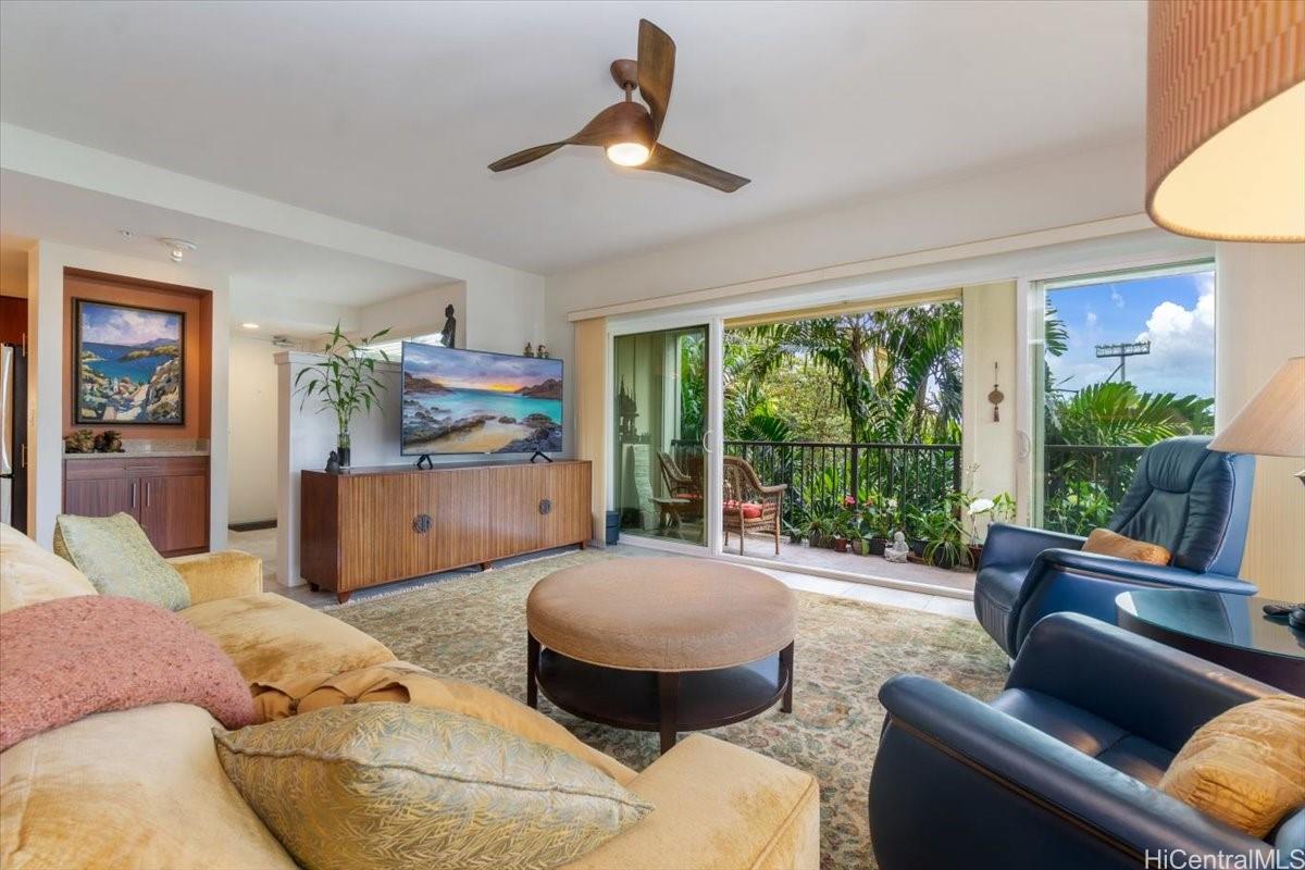 471 Kailua Road, Unit 3201 Kailua, HI 96734 - Photo 1 of 1 This is the view of the LR looking out towards the garden, foyer is behind the wall with the TV.