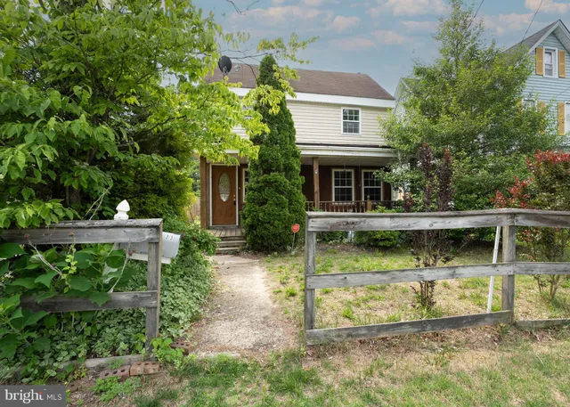 a view of house with swimming pool