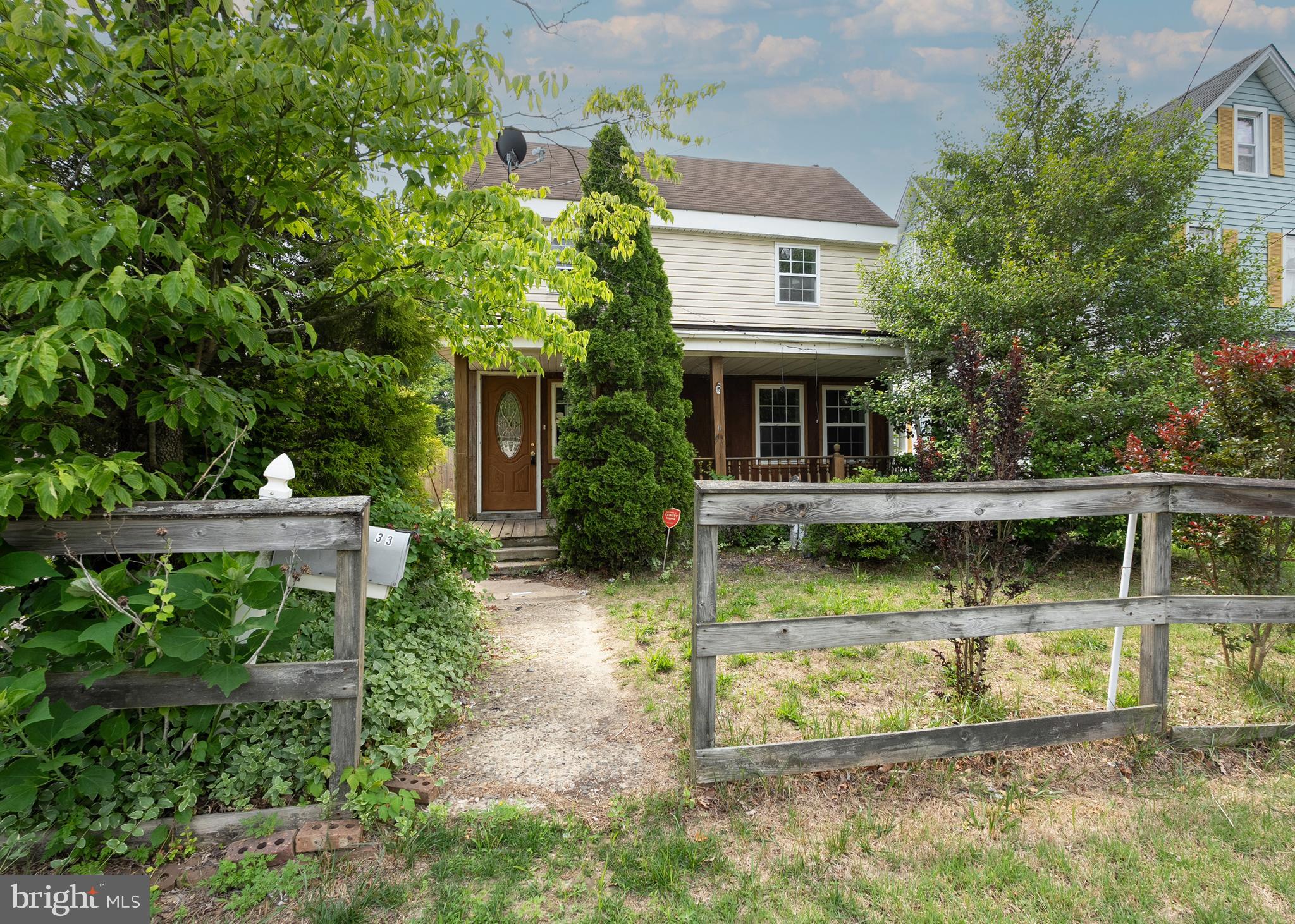 a view of house with swimming pool