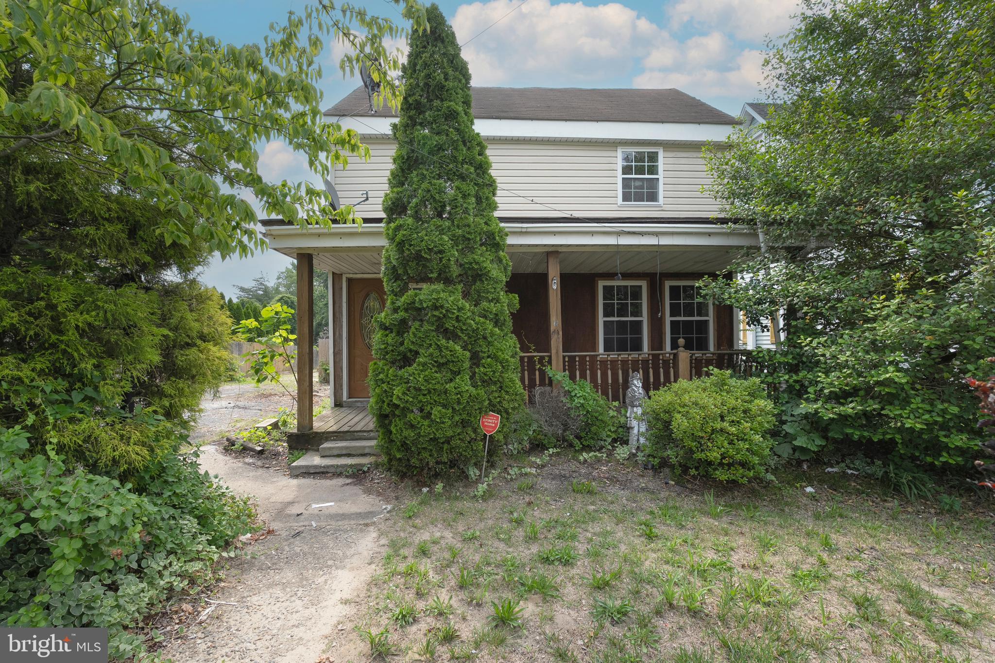 33 Clementon Road West Gibbsboro, NJ 08026 - Photo 2 of 47 a front view of a house with garden