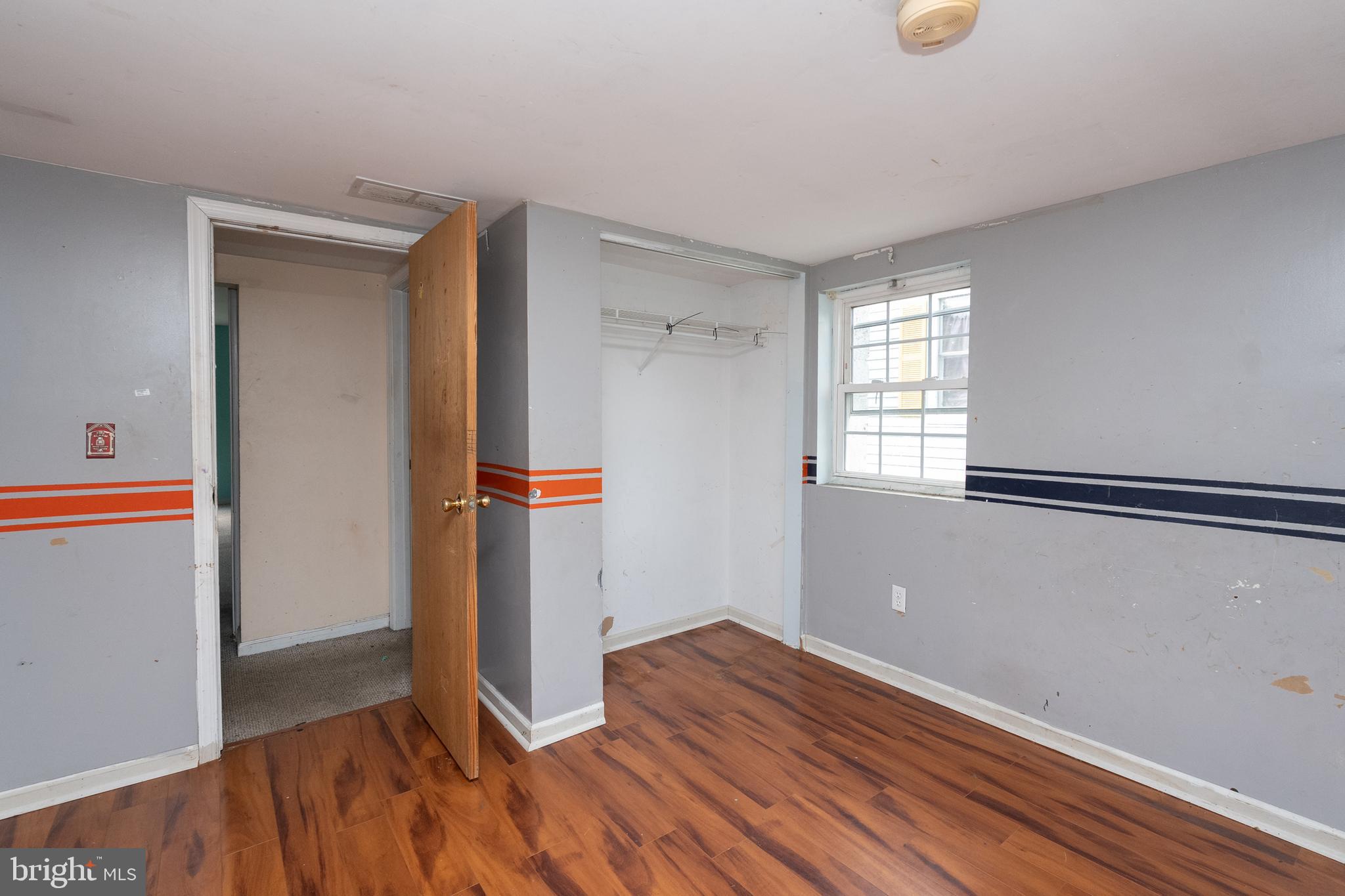 33 Clementon Road West Gibbsboro, NJ 08026 - Photo 36 of 47 an empty room with wooden floor and windows