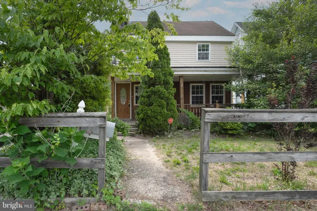a backyard of a house with seating space