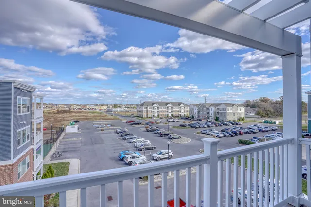 a view of a brick building from a balcony