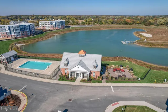 an aerial view of a house with a ocean view