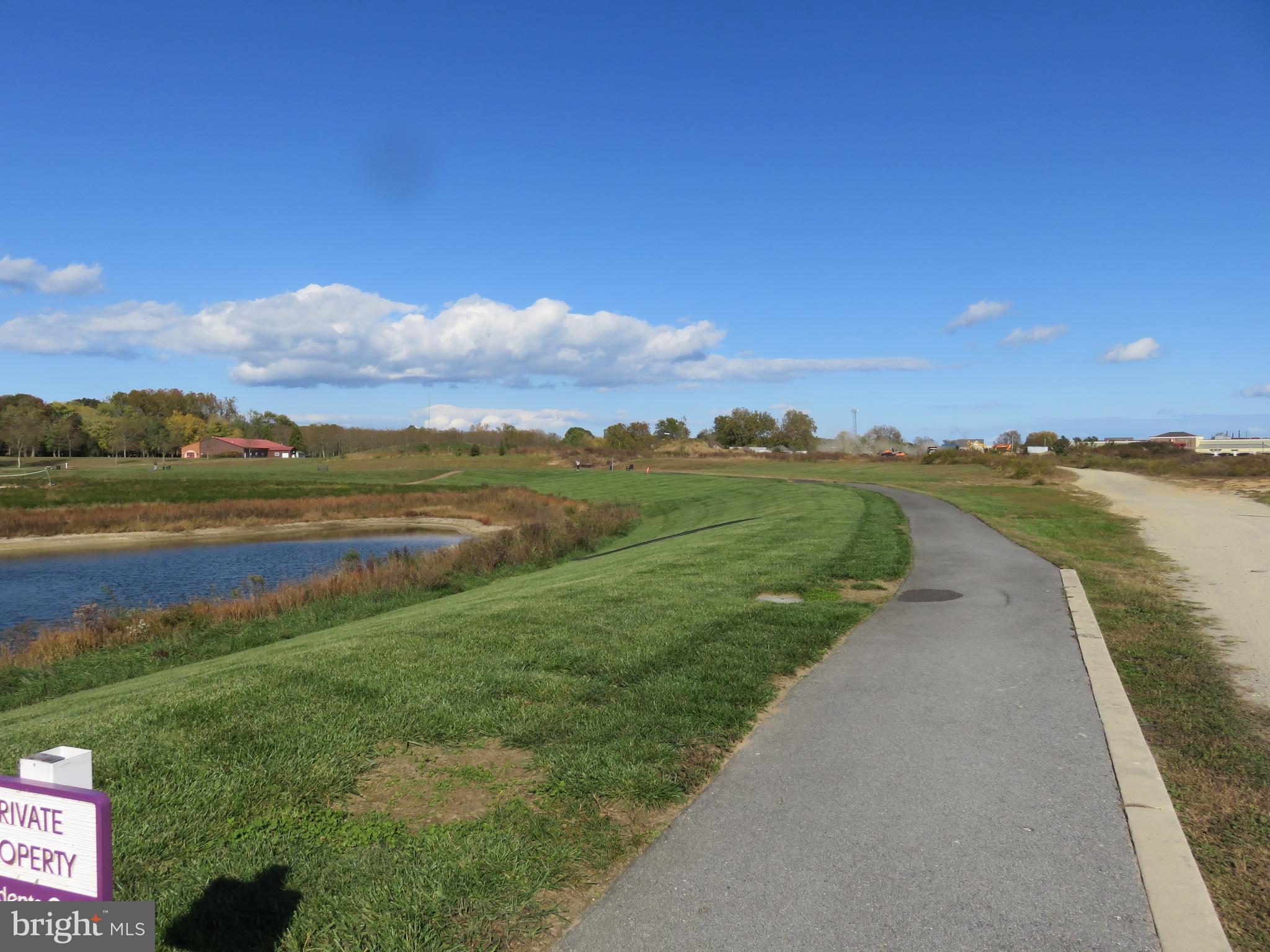 24238 Zinfandel Lane, Unit R404 Lewes, DE 19958 - Photo 10 of 51 Walking trail around lake