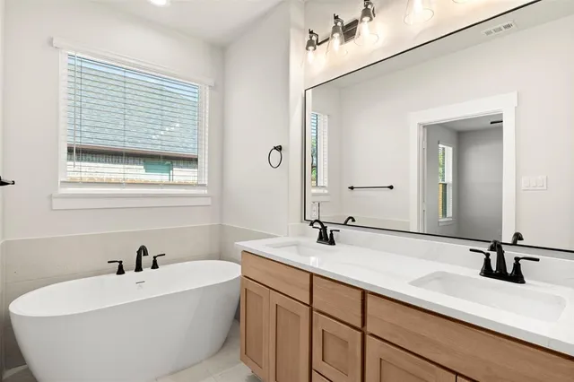 a bathroom with a sink and a bathtub
