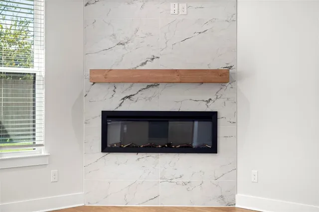 a front view of a house with a fireplace