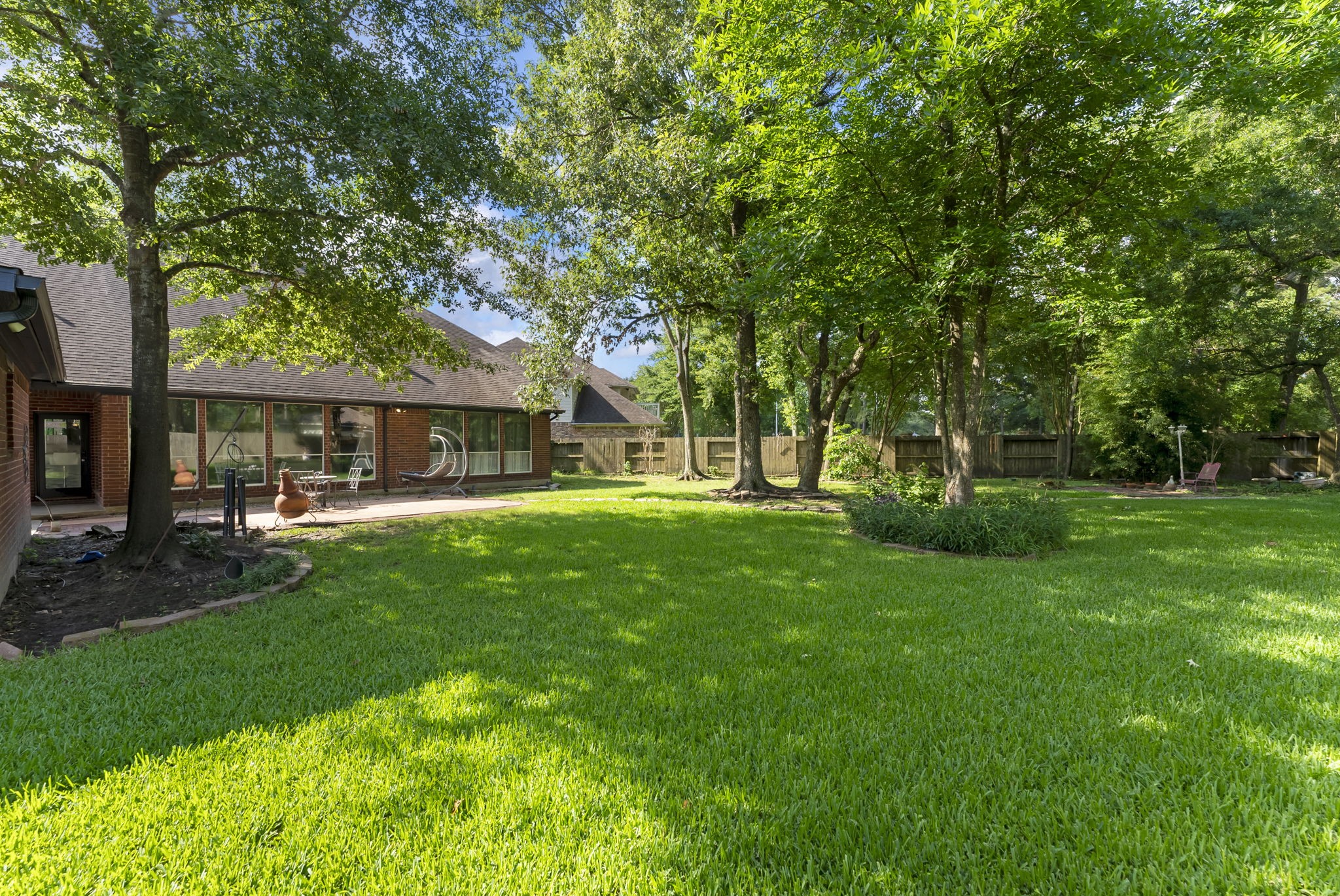 12907 Ryaneagles Circle Houston, TX 77044 - Photo 42 of 48 a view of house with a backyard