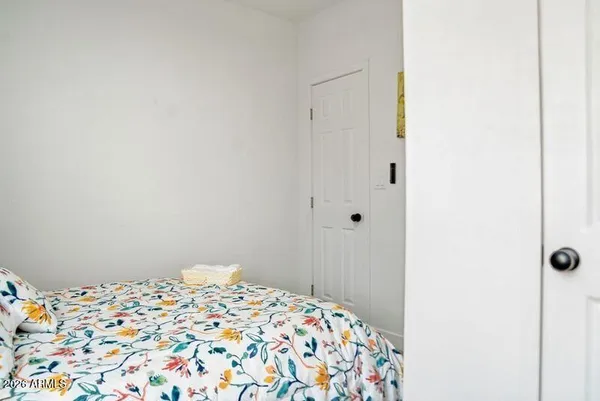 a bedroom with a bed