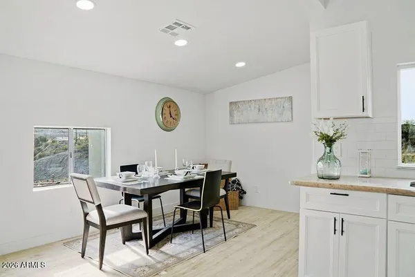 a view of a dining room with furniture