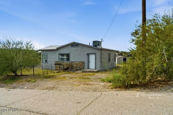 a view of backyard of house