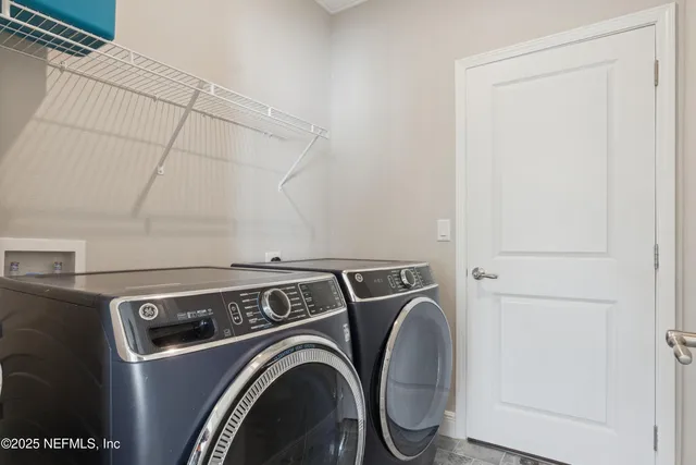 a view of a backyard of a house