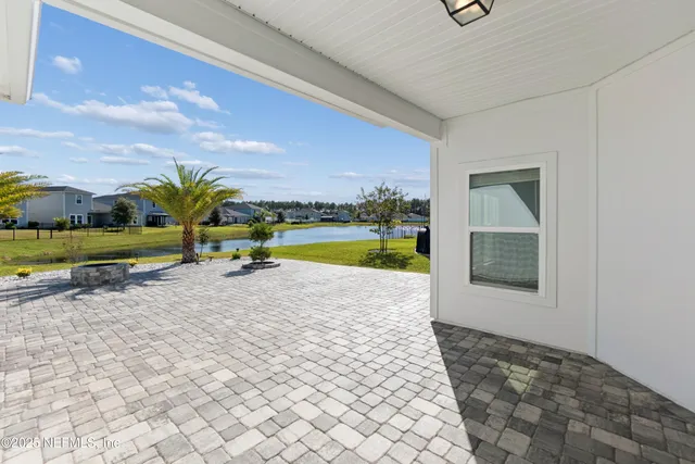 a view of empty room with windows