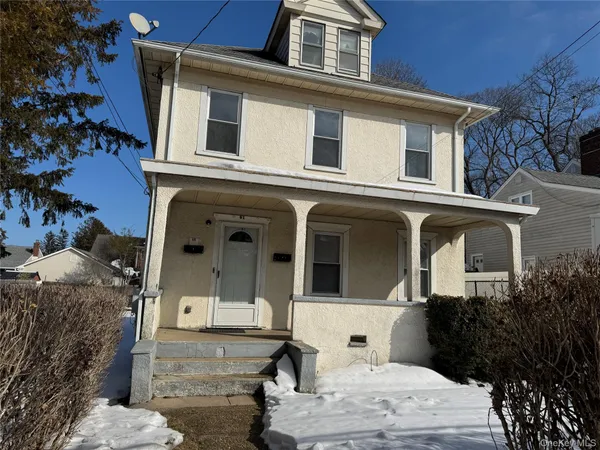 a front view of a house with windows