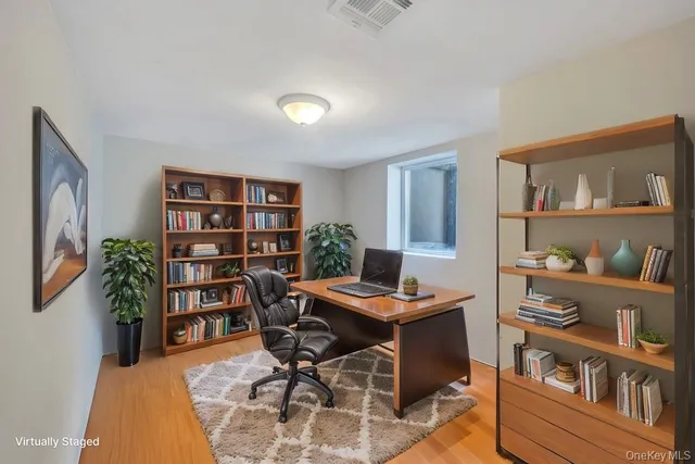 a view of a workspace with furniture and toys