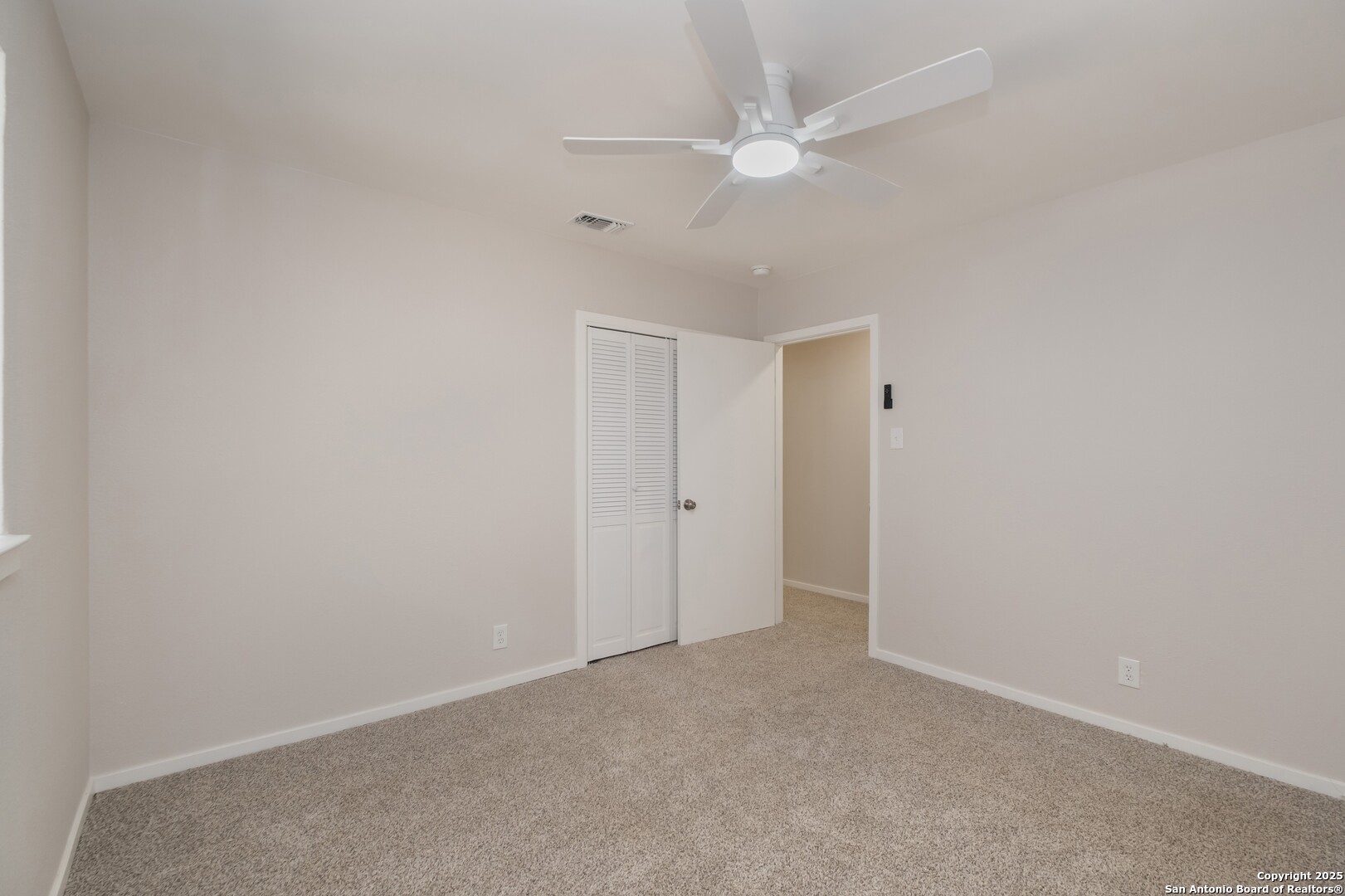 8906 Willmon Way Windcrest, TX 78239 - Photo 22 of 34 a view of an empty room