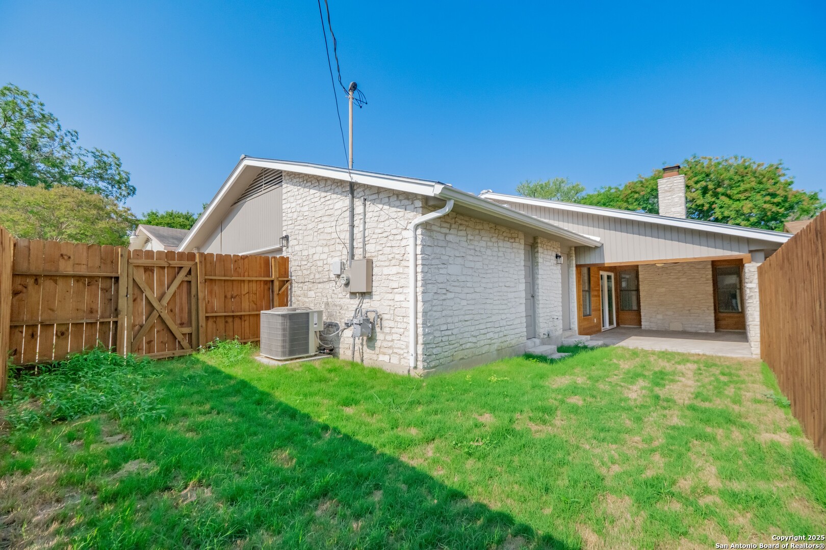 8906 Willmon Way Windcrest, TX 78239 - Photo 30 of 34 a front view of house with yard and porch