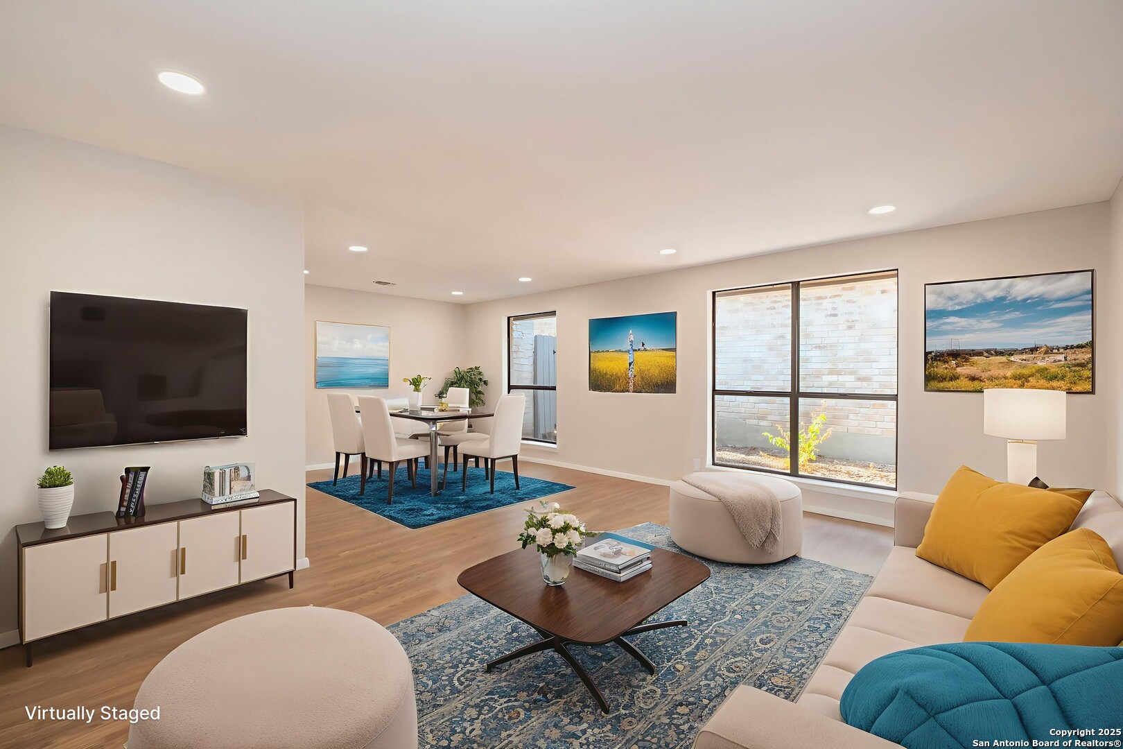 8906 Willmon Way Windcrest, TX 78239 - Photo 4 of 34 a living room with furniture and a flat screen tv