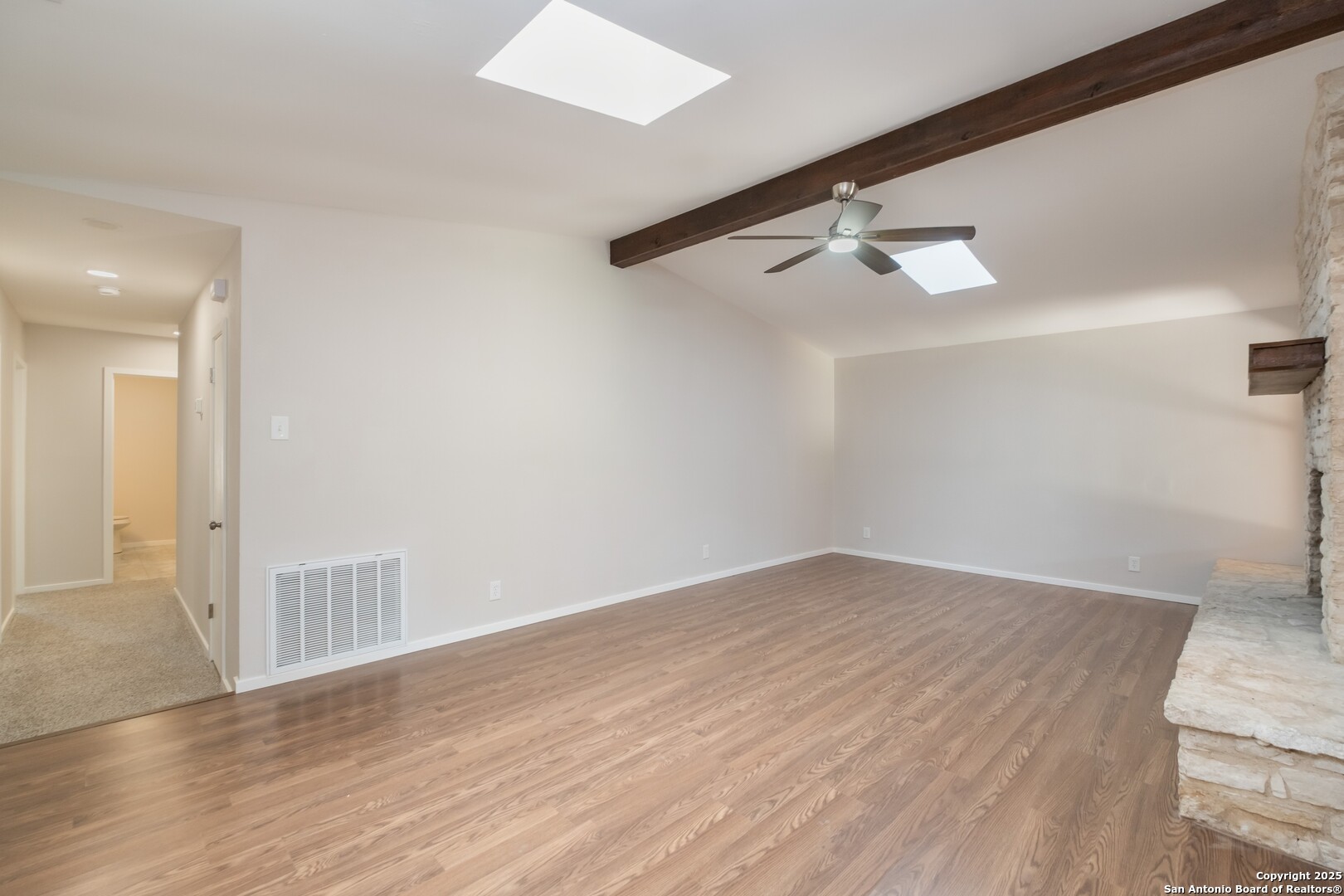 8906 Willmon Way Windcrest, TX 78239 - Photo 8 of 34 wooden floor in an empty room