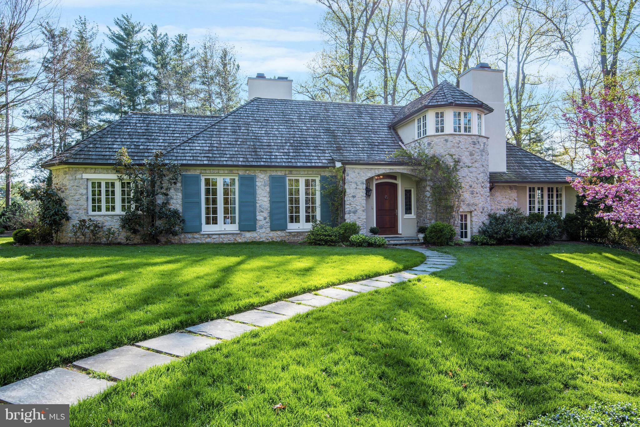 8106 Merrick Road Bethesda, MD 20817 - Photo 2 of 27 front view of a house with a yard