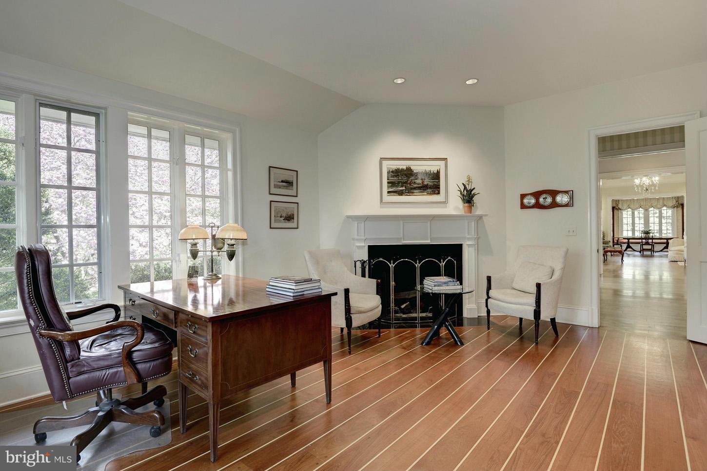 8106 Merrick Road Bethesda, MD 20817 - Photo 17 of 27 a view of a dining room with furniture window and wooden floor